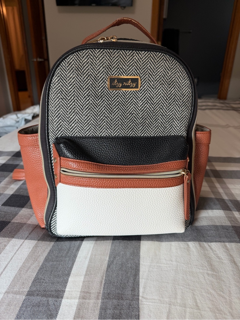 Itzy Ritzy Black, White & Tan Herringbone Accent Backpack